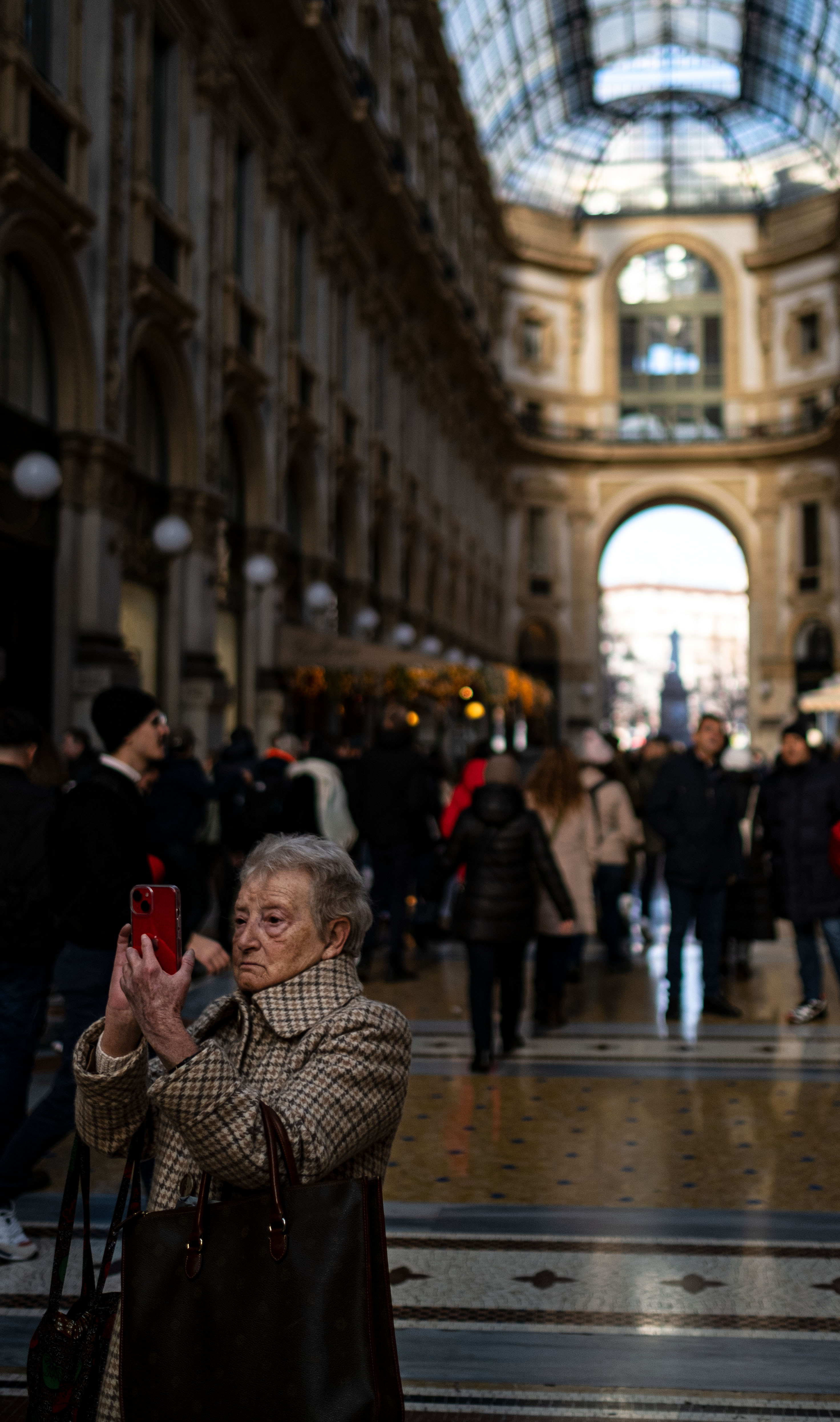 Old lady taking a photo
